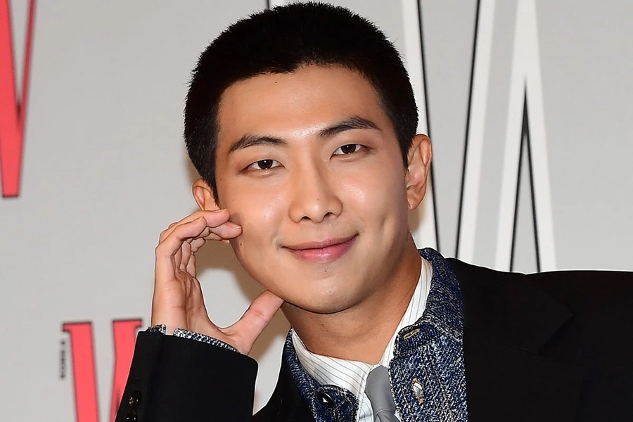 Photos: RM makes a dashing appearance at W Korea's 18th Breast Cancer Awareness Campaign event
